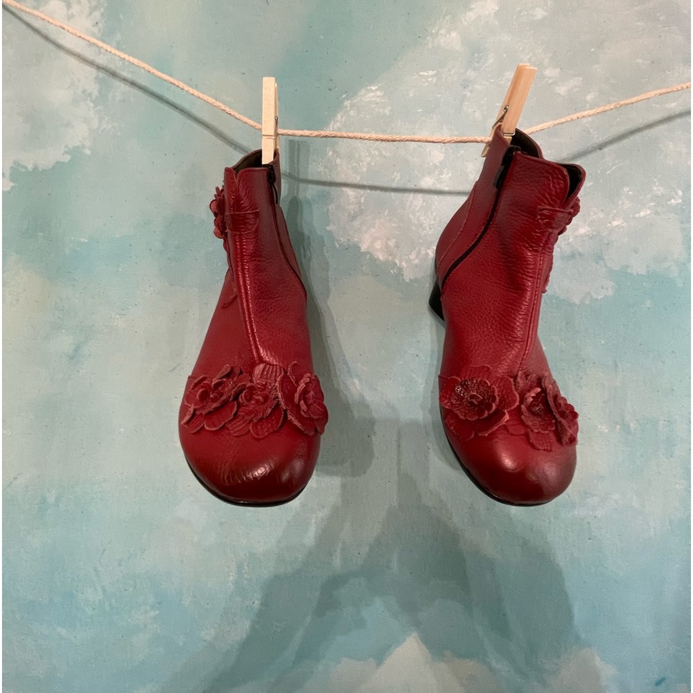 Vintage inspired scarlet leather ankle boots.